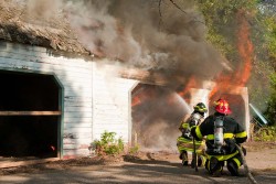TetraKO quickly and effectively knocks down garage fire at this test burn in Rockford, MN